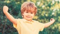 Funny baby boy isolated on a background of green trees. Smiling child boy. Cheerful cheerful kid. Happy children kid boy Royalty Free Stock Photo