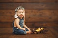 Funny baby boy pilot aviator with airplane laughing Royalty Free Stock Photo