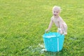 Funny Baby Boy Playing Outside with Water and Bubbles Royalty Free Stock Photo