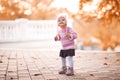 Funny baby girl in street Royalty Free Stock Photo