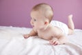 Funny baby lying in bed Royalty Free Stock Photo