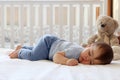 Little baby boy sleeping on stomach Royalty Free Stock Photo