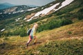 Feel freedom in mountains, woman traveling in unicorn costume Royalty Free Stock Photo