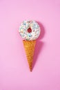 Funny bagel ice-cream on a pink background. Royalty Free Stock Photo
