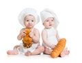 Funny bakers babies boy and girl Royalty Free Stock Photo