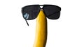 Funny banana in glasses isolated on white,banana fruit in sunglasses Royalty Free Stock Photo