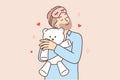 Funny bearded man hugging teddy bear before going to bed feeling attached to gift toy