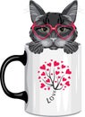 Funny black cat peeking out of a mug