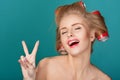 Funny blond woman over blue background Royalty Free Stock Photo