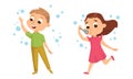 Funny Boy and Girl Playing with Soap Bubbles Vector Set Royalty Free Stock Photo