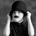 Funny boy with moustache Royalty Free Stock Photo