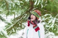 Funny boy screaming of joy playing snow ball Royalty Free Stock Photo