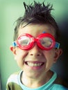 Funny boy smiling in swimming googles Royalty Free Stock Photo