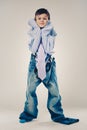 Funny boy wearing Dad`s clothes