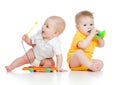 Funny boys with musical toys Royalty Free Stock Photo