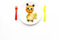Funny breakfast for children. Meal with cheesecake in shape of owl. White background top view copyspace Royalty Free Stock Photo