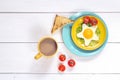 Funny Breakfast with star-shaped fried egg, toast, cherry tomato Royalty Free Stock Photo