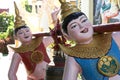 Funny Buddhist Temple Statues Royalty Free Stock Photo