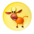 Funny bull made of orange and apple
