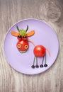 Funny bull made of vegetables on plate