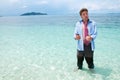 Funny business man on the beach Royalty Free Stock Photo