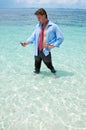 Funny business man on the beach Royalty Free Stock Photo