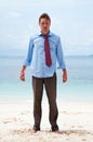 Funny business man on the beach Royalty Free Stock Photo