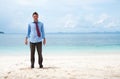 Funny business man on the beach Royalty Free Stock Photo