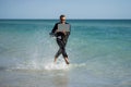 Funny business man in suit on sea. Summer vacation, business on sea beach. Summer rest, business people concept