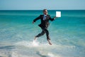 Funny business man in suit on sea. Summer vacation, business on sea beach. Summer rest, business people concept Royalty Free Stock Photo