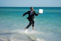 Funny business man in suit on sea. Summer vacation, business on sea beach. Summer rest, business people concept Royalty Free Stock Photo