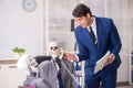 The funny business meeting with boss and skeletons Royalty Free Stock Photo