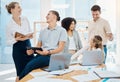 Funny business people, laughing group of designers and cheerful creative office team making jokes together in startup Royalty Free Stock Photo