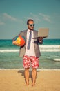 Funny businessman on the beach Royalty Free Stock Photo