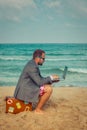 Funny businessman on the beach Royalty Free Stock Photo