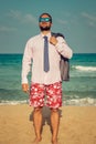 Funny businessman on the beach Royalty Free Stock Photo