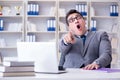 The funny businessman clown acting silly in the office Royalty Free Stock Photo