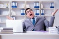 The funny businessman clown acting silly in the office Royalty Free Stock Photo