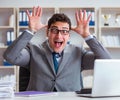 Funny businessman clown acting silly in the office Royalty Free Stock Photo