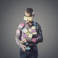 Funny businessman covered with sticky notes Royalty Free Stock Photo