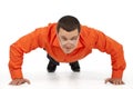 Funny businessman doing push-ups Royalty Free Stock Photo