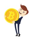 Funny businessman holding Bitcoin. Physical bit coin digital currency cryptocurrency