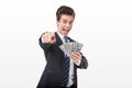 Funny businessman with money pointing at camera Royalty Free Stock Photo