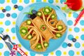 Funny Butterfly face pancakes with berries and fruits for kids` Royalty Free Stock Photo