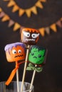 Funny cake pops monsters for Halloween party. Festive sweets