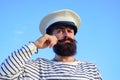 Funny captain sailor wearing hat. Seaman fun. Portrait of serious captain. Bearded sailor, seaman.