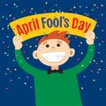 Funny cartoon man holding sign April Fools Day.