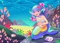 Funny cartoon mermaid in the seascape