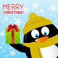 Funny cartoon penguin on winter background