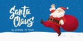 Funny cartoon Santa Claus with huge red bag with presents. Merry Christmas hand drawn text Royalty Free Stock Photo